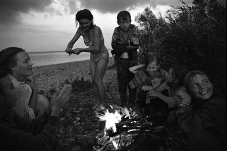 Children after swining on the Volga river during 	
evening. Tatarstan republic. Russia. Project: "From the River to the Sea".
