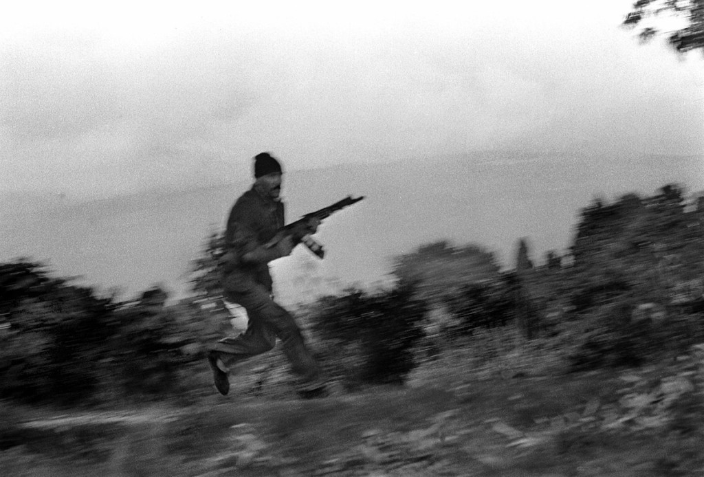 Theme: Geogia-Abkhasia war, 1991-1993. (Story: the soldiers search a sniper in Mandarin forest about Sukhumi,1993, October).
A sniper shoots to them when it’s possible.
Photo by Oleg Klimov/agency.photographer.ru