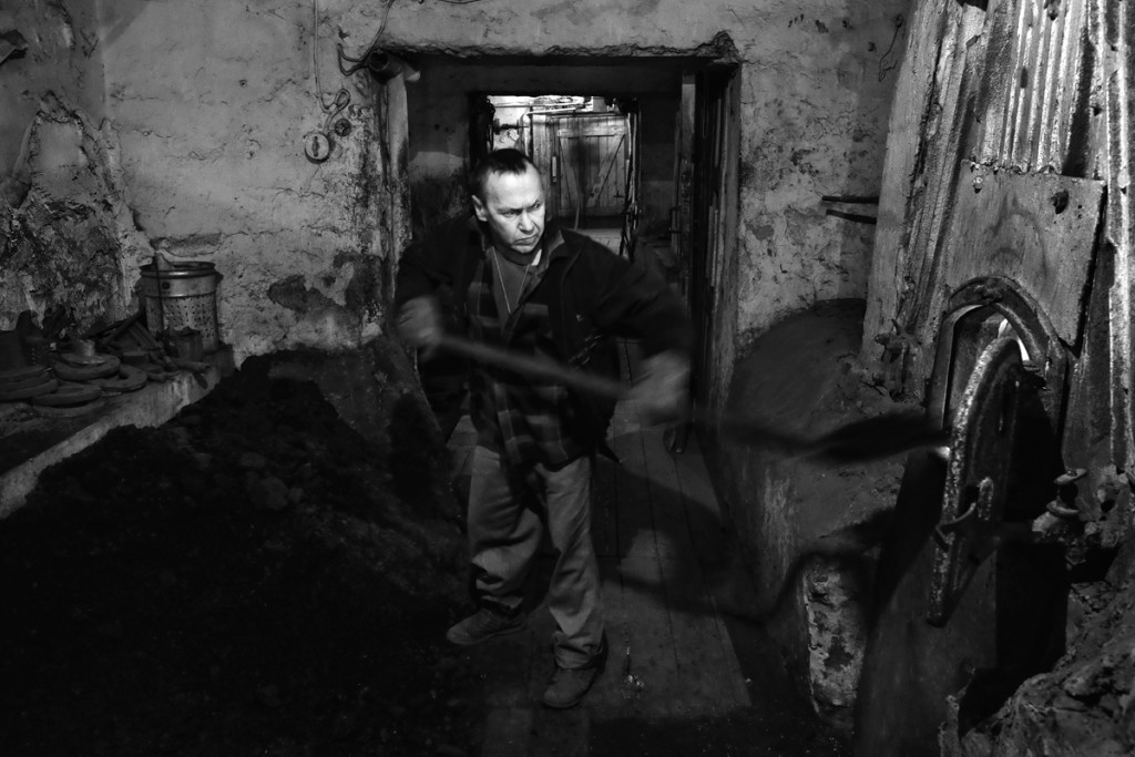 Each hour a stoker Valery should throw coals into the furnace to heat  the administration building and two houses during a New Year’s Eve in the village of Due.

Sakhalin still depends on coal for heating, even though a lot of gas and oil is extracted in the region and exported to nearby areas like China, Korea and Japan.
